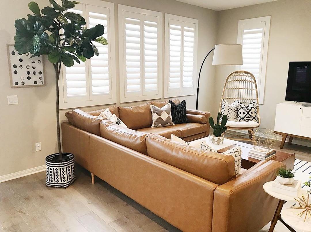 Warm living room with Polywood shutters in Phoenix.